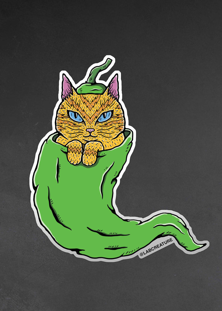 Photo of a vinyl sticker featuring an illustration of a cat inside of a green chile