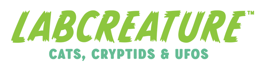 Logo that says "Labcreature" in a green pulpy comic font and on the second line it says "Cats, Cryptids & UFOs" in blue green.
